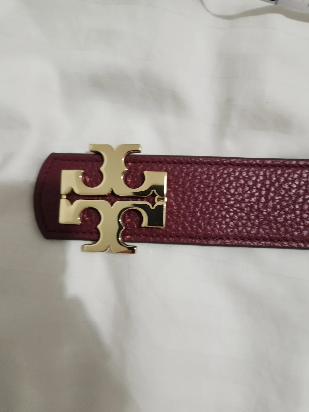 Tory Burch Pebbled Leather Belt in Burgundy with Gold Logo Buckle